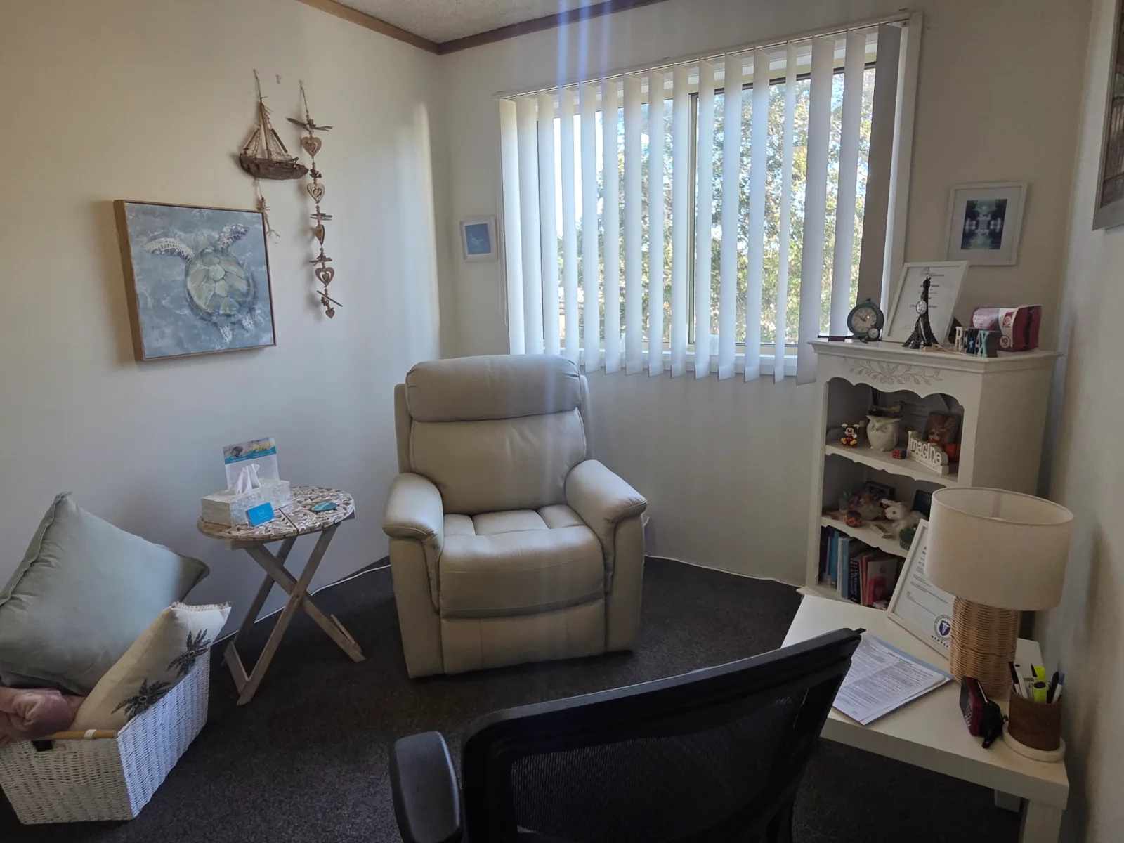 A comfortable chair in the Terrigal therapy room — who sees a hypnotherapist